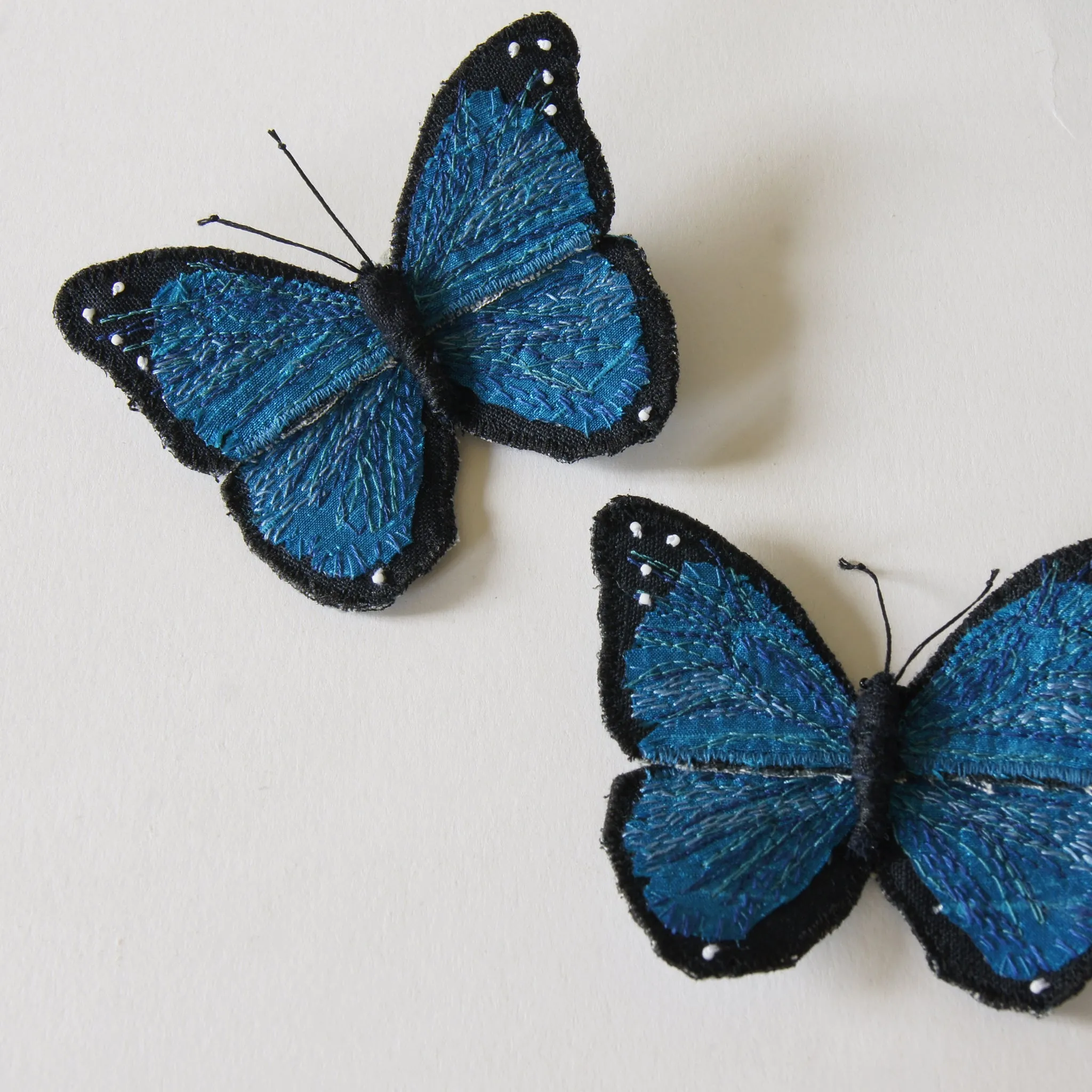 Menelaus blue morpho fiber art brooch