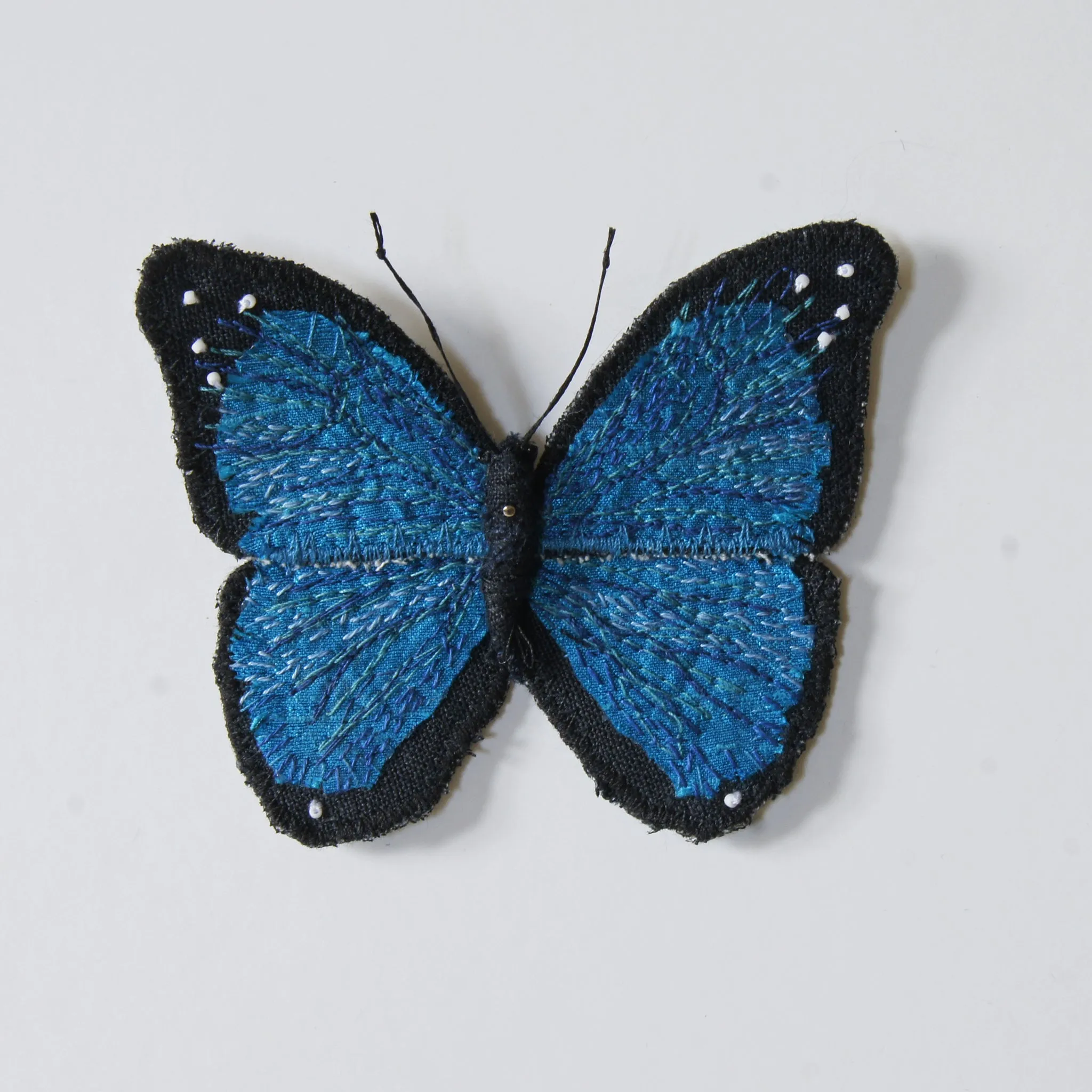 Menelaus blue morpho fiber art brooch