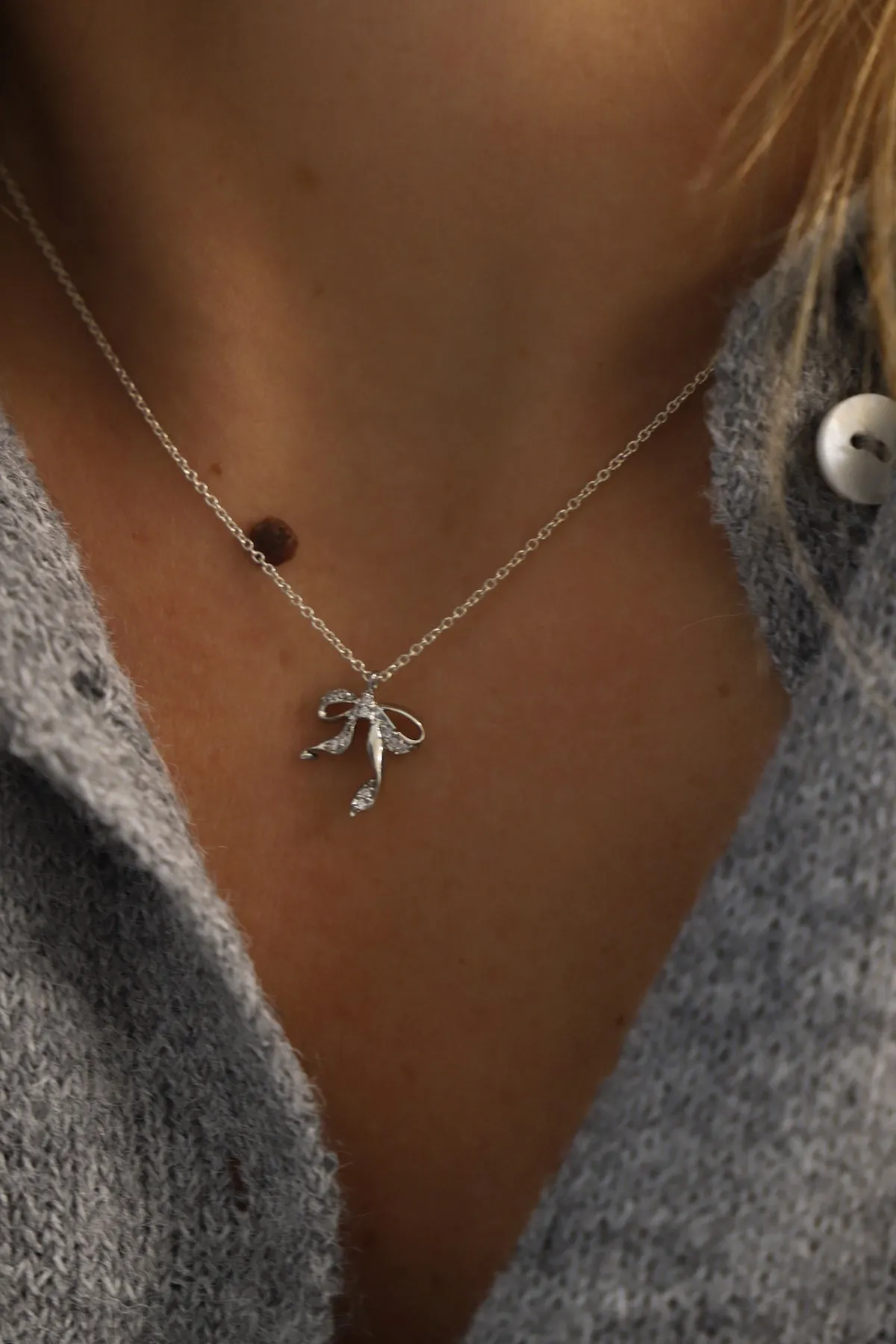 SILVER CZ BOW NECKLACE